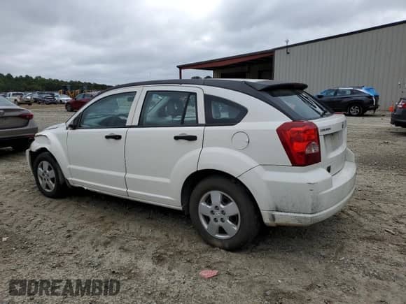 2007 Dodge Caliber with VIN 1B3HB28B87D218447, listed as a Copart auction lot 73716694 with 173,201 mi miles and Salvage title. Bid and sale history available at DreamBid. Image 2.