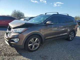 2015 Hyundai Santa Fe Limited с VIN KM8SR4HF8FU117255, выставлен на аукционе Copart как лот 90900355 с пробегом 173 762 миль миль и Чистый • Clean title. История ставок и продаж доступна на DreamBid. Изображение 1.