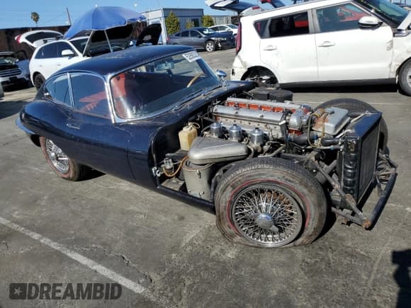 ✅ 1966 Jaguar E-Type • VIN: 1E32907 • Lot: 52883214. Wystawiony na Copart z przebiegiem 14 227 mil. Bezpłatny archiwum sprzedaży aukcyjnych z USA i szczegółowy raport historii pojazdu na DreamBid. Zdjęcie 4.