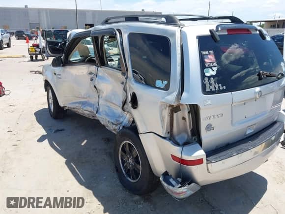 2010 Mercury Mariner z VIN 4M2CN8B75AKJ13322, wystawiony jako IAAI lot #42832064 z przebiegiem 205 074 mil mil oraz . Historia ofert i sprzedaży dostępna na DreamBid. Obrazek 21.