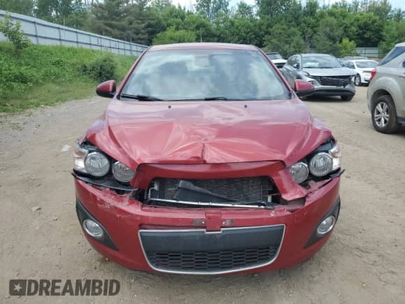 2012 Chevrolet Sonic LTZ with VIN 1G1JE5SH5C4152268, listed as a Copart auction lot 61047295 with 137,502 mi miles and Salvage title. Bid and sale history available at DreamBid. Image 5.