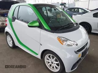 ✅ 2014 Smart fortwo Passion • VIN: WMEEJ9AA8EK736860 • Lot: 42496807. Listed on IAAI with Not provided. Free auction sales archive from the USA and detailed vehicle history report at DreamBid. Image 1.