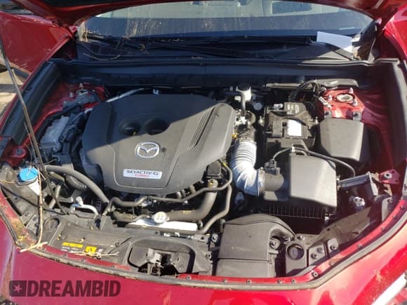 ✅ 2021 Mazda CX-30 Premium • VIN: 3MVDMBDY2MM265585 • Lot: 56051584. Wystawiony na Copart z przebiegiem 20 156 mil. Bezpłatny archiwum sprzedaży aukcyjnych z USA i szczegółowy raport historii pojazdu na DreamBid. Zdjęcie 12.