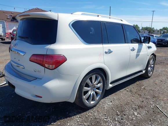 ✅ 2014 Infiniti QX80 • VIN: JN8AZ2NE9E9064040 • Lot: 43014644. Listed on IAAI with 141,766 mi. Free auction sales archive from the USA and detailed vehicle history report at DreamBid. Image 4.