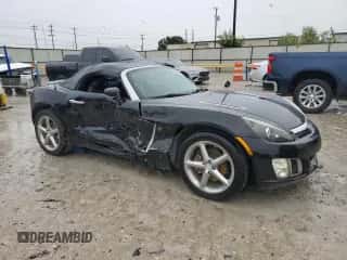 2009 Saturn Sky Red Line z VIN 1G8MG35X39Y106052, wystawiony jako Copart lot #69893854 z przebiegiem 124 937 mil mil oraz Szkoda całkowita • Salvage title. Historia ofert i sprzedaży dostępna na DreamBid. Obrazek 4.