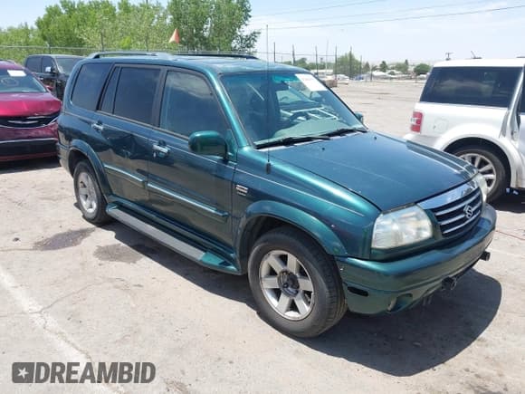 ✅ 2002 Suzuki XL7 Standard • VIN: JS3TX92V624103748 • Lot: 42484935. Listed on IAAI with 211,323 mi. Free auction sales archive from the USA and detailed vehicle history report at DreamBid. Image 1.