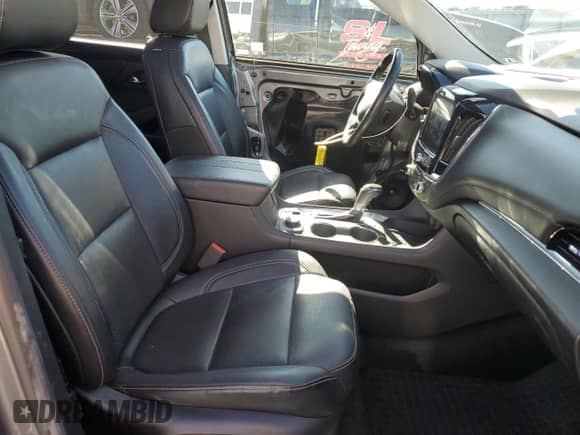 2018 Chevrolet Traverse Premier z VIN 1GNEVJKW2JJ182964, wystawiony jako Copart lot #86875655 z przebiegiem 97 375 mil mil oraz Szkoda całkowita • Salvage title. Historia ofert i sprzedaży dostępna na DreamBid. Obrazek 7.