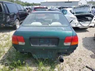 ✅ 1998 Honda Civic EX • VIN: 2HGEJ8549WH614855 • Lot: 66486384. Listed on Copart with 100,465 mi. Free auction sales archive from the USA and detailed vehicle history report at DreamBid. Image 6.