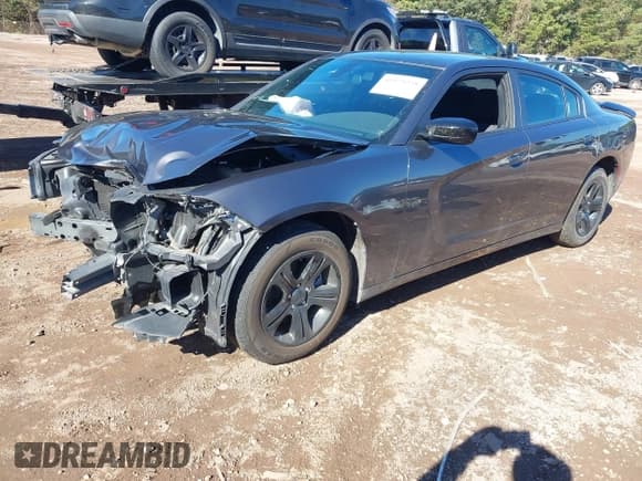 ✅ 2022 Dodge Charger SXT • VIN: 2C3CDXBG1NH239469 • Lot: 43579238. Listed on IAAI with 66,557 mi. Free auction sales archive from the USA and detailed vehicle history report at DreamBid. Image 2.