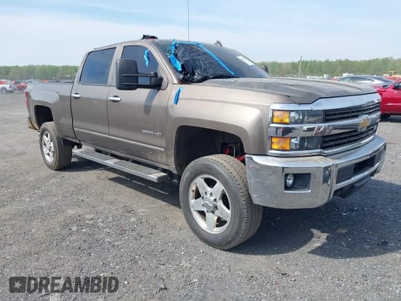 ✅ 2015 Chevrolet Silverado 2500HD LTZ • VIN: 1GC1KWE89FF183873 • Lot: 42114681. Listed on IAAI with 113,443 mi. Free auction sales archive from the USA and detailed vehicle history report at DreamBid. Image 1.