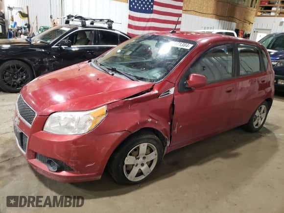 2009 Chevrolet Aveo 1LT z VIN KL1TD66E29B331792, wystawiony jako Copart lot #81171384 z przebiegiem 124 288 mil mil oraz Czysty tytuł • Clean title. Historia ofert i sprzedaży dostępna na DreamBid. Obrazek 1.