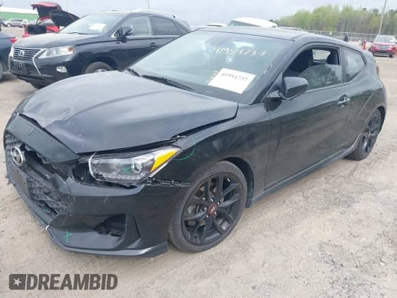 2019 Hyundai Veloster Turbo z VIN KMHTH6AB3KU020159, wystawiony jako IAAI lot #41954737 z przebiegiem 152 070 mil mil oraz . Historia ofert i sprzedaży dostępna na DreamBid. Obrazek 2.