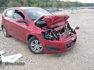 2015 Chevrolet Sonic LT with VIN 1G1JC6SH9F4113781, listed as a IAAI auction lot 43111610 with 70,632 mi miles and . Bid and sale history available at DreamBid. Image 1.