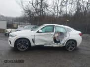 ✅ 2016 BMW X6 M • VIN: 5YMKW8C50G0R43150 • Lot: 41463258. Listed on IAAI with 81,202 mi. Free auction sales archive from the USA and detailed vehicle history report at DreamBid. Image 14.