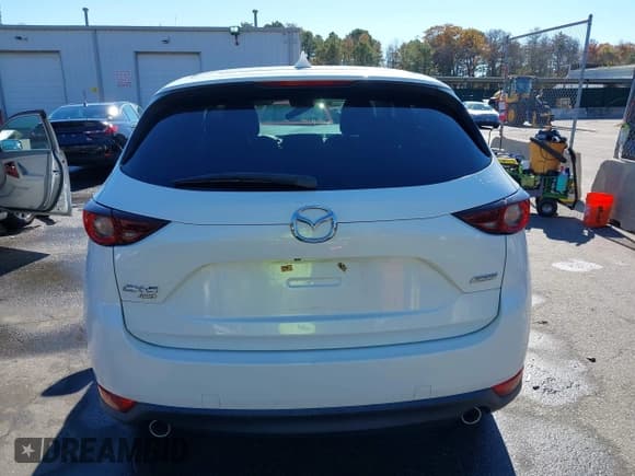 ✅ 2019 Mazda CX-5 Touring • VIN: JM3KFBCM4K0698771 • Лот: 43542861. Опубликован ранее на IAAI с пробегом 52 778 миль. Бесплатный доступ к архиву аукционных продаж из США и подробный отчёт об истории автомобиля на DreamBid. Изображение 17.