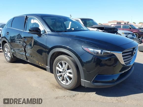 ✅ 2016 Mazda CX-9 Touring • VIN: JM3TCACY1G0115459 • Lot: 43354306. Listed on IAAI with 71,084 mi. Free auction sales archive from the USA and detailed vehicle history report at DreamBid. Image 1.