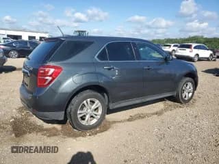 ✅ 2017 Chevrolet Equinox LS • VIN: 2GNALBEK6H1581562 • Лот: 71275835. Опубликован ранее на Copart с пробегом 123 424 миль. Бесплатный доступ к архиву аукционных продаж из США и подробный отчёт об истории автомобиля на DreamBid. Изображение 3.