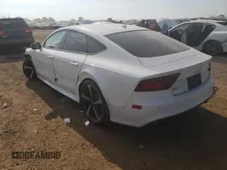 ✅ 2016 Audi RS 7 Prestige • VIN: WUAW2AFC5GN903014 • Лот: 68769174. Опубликован ранее на Copart с пробегом 74 110 миль. Бесплатный доступ к архиву аукционных продаж из США и подробный отчёт об истории автомобиля на DreamBid. Изображение 2.