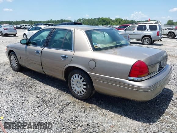 ✅ 2001 Ford Crown Victoria • VIN: 2FAFP73W71X194548 • Лот: 42711398. Опубликован ранее на IAAI с пробегом 264 018 миль. Бесплатный доступ к архиву аукционных продаж из США и подробный отчёт об истории автомобиля на DreamBid. Изображение 3.