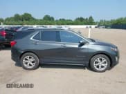 ✅ 2019 Chevrolet Equinox Premier • VIN: 2GNAXNEV4K6184569 • Lot: 42670537. Listed on IAAI with 163,594 mi. Free auction sales archive from the USA and detailed vehicle history report at DreamBid. Image 13.