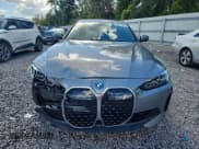 ✅ 2024 BMW i4 eDrive35 • VIN: WBY43AW05RFR51406 • Лот: 83773395. Опубликован ранее на Copart с пробегом 19 458 миль. Бесплатный доступ к архиву аукционных продаж из США и подробный отчёт об истории автомобиля на DreamBid. Изображение 5.