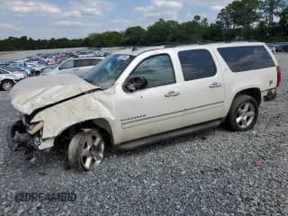 ✅ 2013 Chevrolet Suburban LTZ • VIN: 1GNSCKE00DR288566 • Лот: 52206684. Опубликован ранее на Copart с пробегом 189 757 миль. Бесплатный доступ к архиву аукционных продаж из США и подробный отчёт об истории автомобиля на DreamBid. Изображение 1.