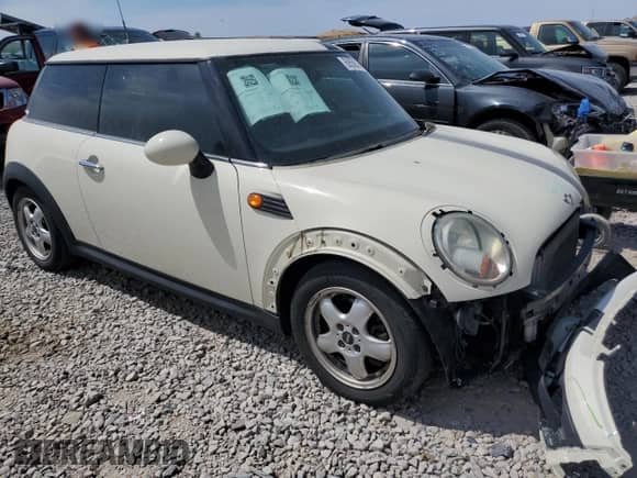 2009 MINI Hardtop with VIN WMWMF33539TT69081, listed as a Copart auction lot 58087205 with 106,470 mi miles and Salvage title. Bid and sale history available at DreamBid. Image 4.