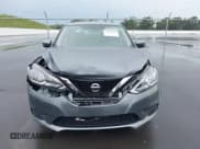 ✅ 2017 Nissan Sentra SL • VIN: 3N1AB7AP8HY295906 • Lot: 43188421. Listed on IAAI with 60,040 mi. Free auction sales archive from the USA and detailed vehicle history report at DreamBid. Image 12.