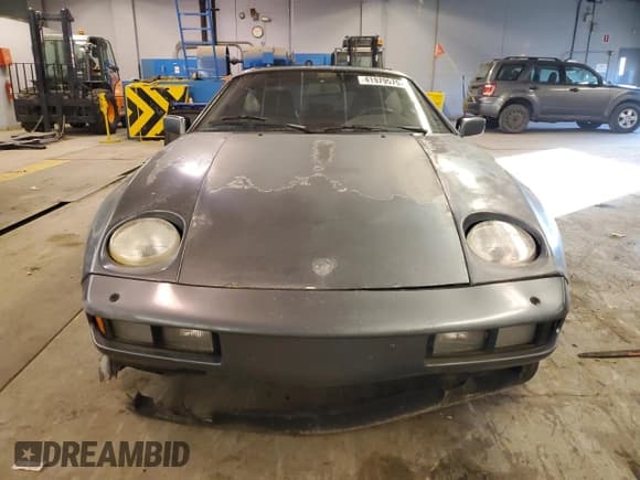 ✅ 1984 Porsche 928 • VIN: WP0JB0925ES861303 • Lot: 41979575. Wystawiony na Copart z przebiegiem 114 593 mil. Bezpłatny archiwum sprzedaży aukcyjnych z USA i szczegółowy raport historii pojazdu na DreamBid. Zdjęcie 5.