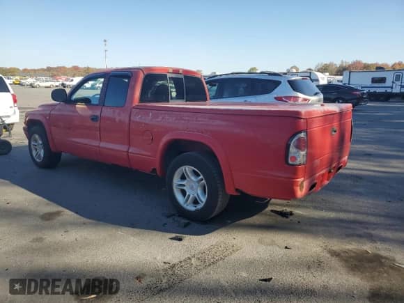 1999 Dodge Dakota Sport z VIN 1B7GL22Z4XS276158, wystawiony jako Copart lot #76972714 z przebiegiem 159 628 mil mil oraz Szkoda całkowita • Salvage title. Historia ofert i sprzedaży dostępna na DreamBid. Obrazek 2.