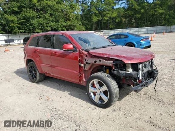 ✅ 2015 Jeep Grand Cherokee SRT • VIN: 1C4RJFDJ0LC348569 • Лот: 68952885. Опубликован ранее на Copart с пробегом 70 971 миль. Бесплатный доступ к архиву аукционных продаж из США и подробный отчёт об истории автомобиля на DreamBid. Изображение 4.