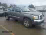 2005 Dodge Dakota SLT with VIN 1D7HE42N65S189095, listed as a Copart auction lot 78869074 with 121,993 mi miles and Salvage title. Bid and sale history available at DreamBid. Image 4.