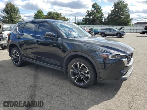 ✅ 2023 Mazda CX-5 S Premium • VIN: JM3KFBDM7P0254239 • Lot: 89872315. Wystawiony na Copart z przebiegiem 29 415 mil. Bezpłatny archiwum sprzedaży aukcyjnych z USA i szczegółowy raport historii pojazdu na DreamBid. Zdjęcie 4.
