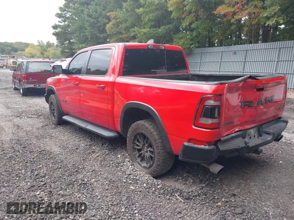 ✅ 2021 Ram 1500 Rebel • VIN: 1C6SRFLT2MN591844 • Lot: 40410248. Listed on IAAI with 84,759 mi. Free auction sales archive from the USA and detailed vehicle history report at DreamBid. Image 3.