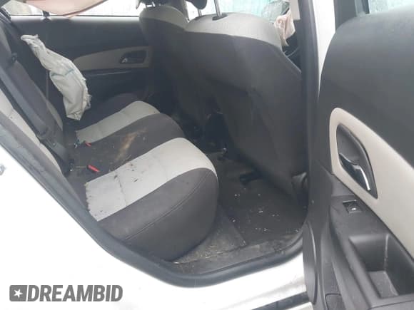 ✅ 2013 Chevrolet Cruze LS • VIN: 1G1PA5SG5D7293757 • Lot: 43527179. Listed on IAAI with 185,139 mi. Free auction sales archive from the USA and detailed vehicle history report at DreamBid. Image 8.