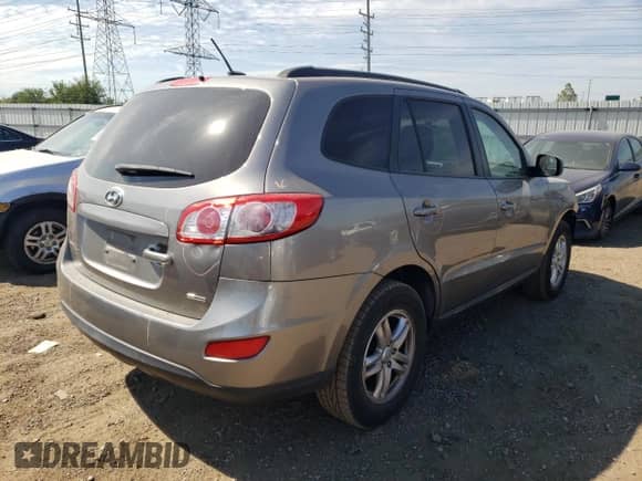 2012 Hyundai Santa Fe GLS with VIN 5XYZGDAB9CG156305, listed as a Copart auction lot 71676244 with 155,861 mi miles and Salvage title. Bid and sale history available at DreamBid. Image 3.