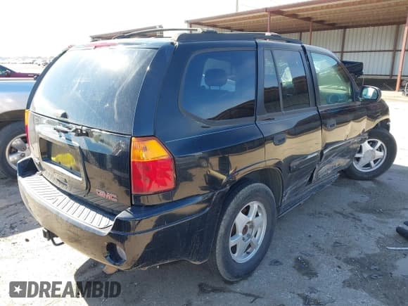 ✅ 2003 GMC Envoy SLE • VIN: 1GKDS13S732134354 • Lot: 41305506. Listed on IAAI with 221,733 mi. Free auction sales archive from the USA and detailed vehicle history report at DreamBid. Image 4.