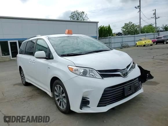 ✅ 2020 Toyota Sienna LE • VIN: 5TDJZ3DCXLS249696 • Lot: 64382785. Listed on Copart with 99,530 mi. Free auction sales archive from the USA and detailed vehicle history report at DreamBid. Image 14.