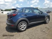 ✅ 2021 Mazda CX-3 Sport • VIN: JM1DKDB74M1501390 • Лот: 65446315. Опубликован ранее на Copart с пробегом 27 764 миль. Бесплатный доступ к архиву аукционных продаж из США и подробный отчёт об истории автомобиля на DreamBid. Изображение 3.