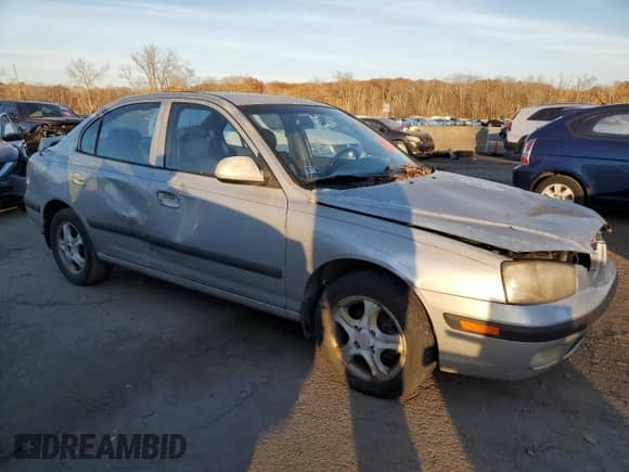 2003 Hyundai Elantra GLS z VIN KMHDN45D73U633397, wystawiony jako Copart lot #79562704 z przebiegiem 127 366 mil mil oraz Czysty tytuł • Clean title. Historia ofert i sprzedaży dostępna na DreamBid. Obrazek 4.