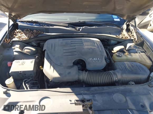 ✅ 2012 Dodge Charger SE • VIN: 2C3CDXBG1CH102593 • Lot: 43583549. Listed on IAAI with 166,100 mi. Free auction sales archive from the USA and detailed vehicle history report at DreamBid. Image 10.