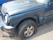 ✅ 2002 Jeep Liberty Limited • VIN: 1J4GL58KX2W339237 • Lot: 42284526. Listed on IAAI with 183,416 mi. Free auction sales archive from the USA and detailed vehicle history report at DreamBid. Image 6.