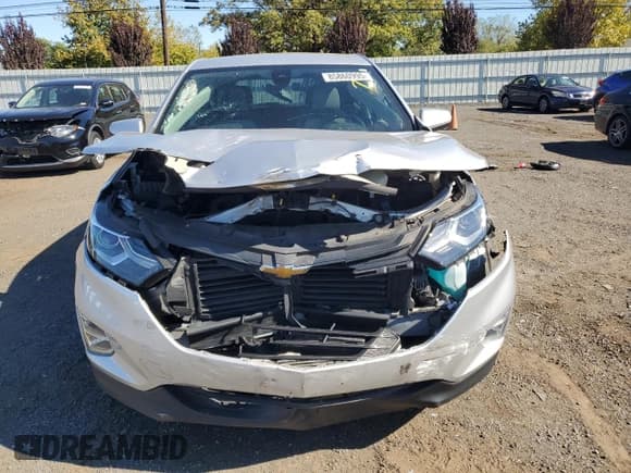 ✅ 2021 Chevrolet Equinox LT • VIN: 3GNAXUEV1MS124909 • Lot: 85860995. Listed on Copart with 88,479 mi. Free auction sales archive from the USA and detailed vehicle history report at DreamBid. Image 5.