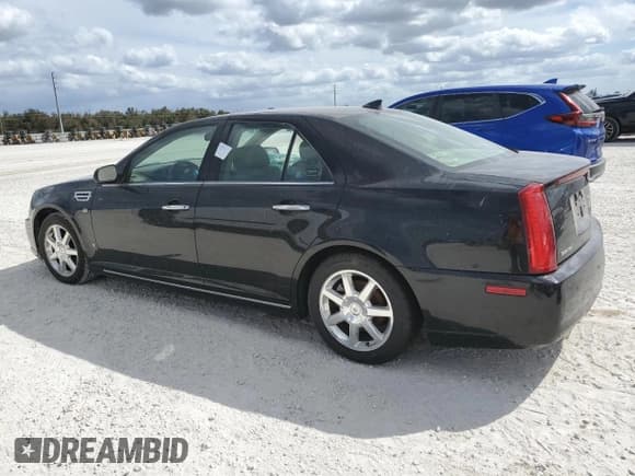 ✅ 2009 Cadillac STS RWD • VIN: 1G6DW67V690134595 • Лот: 76619544. Опубликован ранее на Copart с пробегом Не указан. Бесплатный доступ к архиву аукционных продаж из США и подробный отчёт об истории автомобиля на DreamBid. Изображение 2.