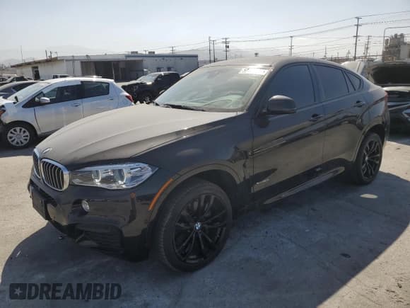 ✅ 2019 BMW X6 xDrive50i • VIN: 5UXKU6C52KLP60647 • Lot: 59463424. Listed on Copart with 41,351 mi. Free auction sales archive from the USA and detailed vehicle history report at DreamBid. Image 1.