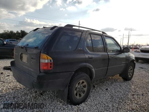 ✅ 1999 Isuzu Rodeo S • VIN: 4S2CK58W3X4362974 • Lot: 43155155. Listed on Copart with 396,448 mi. Free auction sales archive from the USA and detailed vehicle history report at DreamBid. Image 3.