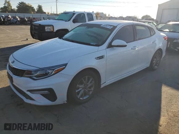 ✅ 2019 Kia Optima LX • VIN: 5XXGT4L36KG306494 • Lot: 85364175. Listed on Copart with 169,021 mi. Free auction sales archive from the USA and detailed vehicle history report at DreamBid. Image 1.