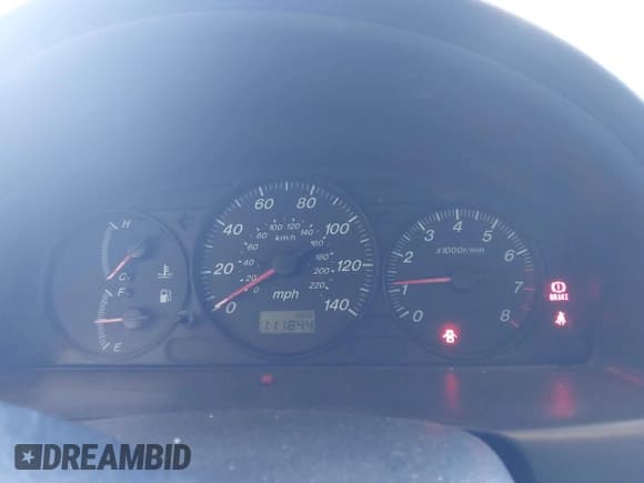 ✅ 2001 Mazda Protege LX • VIN: JM1BJ225210492624 • Lot: 43017930. Wystawiony na IAAI z przebiegiem 111 844 mil. Bezpłatny archiwum sprzedaży aukcyjnych z USA i szczegółowy raport historii pojazdu na DreamBid. Zdjęcie 7.