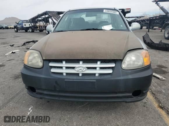 2004 Hyundai Accent GL с VIN KMHCG45C34U567915, выставлен на аукционе Copart как лот 43654985 с пробегом 141 461 миль миль и Чистый • Clean title. История ставок и продаж доступна на DreamBid. Изображение 5.