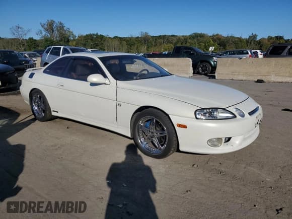 ✅ 1999 Lexus SC 400 • VIN: JT8CH32Y6X1002865 • Lot: 82233355. Listed on Copart with 387,574 mi. Free auction sales archive from the USA and detailed vehicle history report at DreamBid. Image 4.